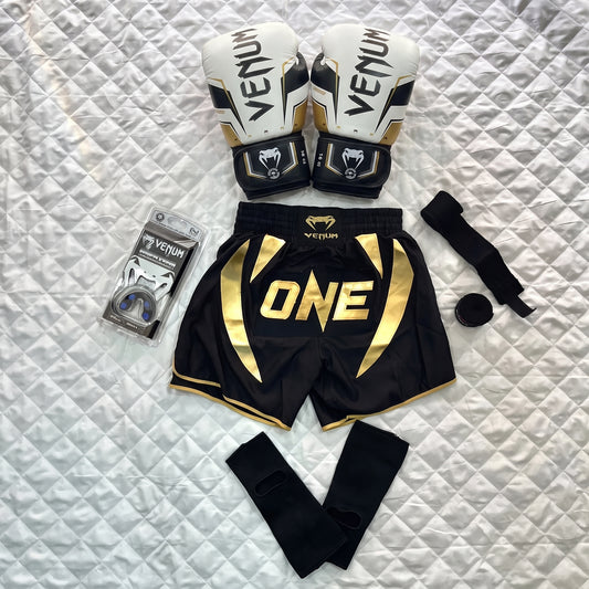 Pack Venum Elite ( Gant Venum Gold + Protege dent Venum + Bonde 4,5m + Bonde Cheville + Short ONE )
