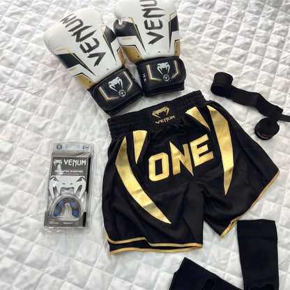 Pack Venum Elite ( Gant Venum Gold + Protege dent Venum + Bonde 4,5m + Bonde Cheville + Short ONE )